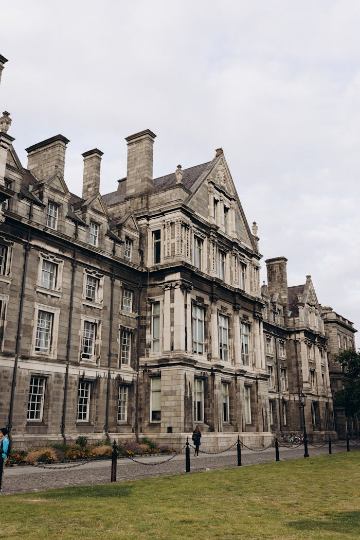 Historic architecture at Trinity College, Dublin, showcasing classic stone facade and elegant design.